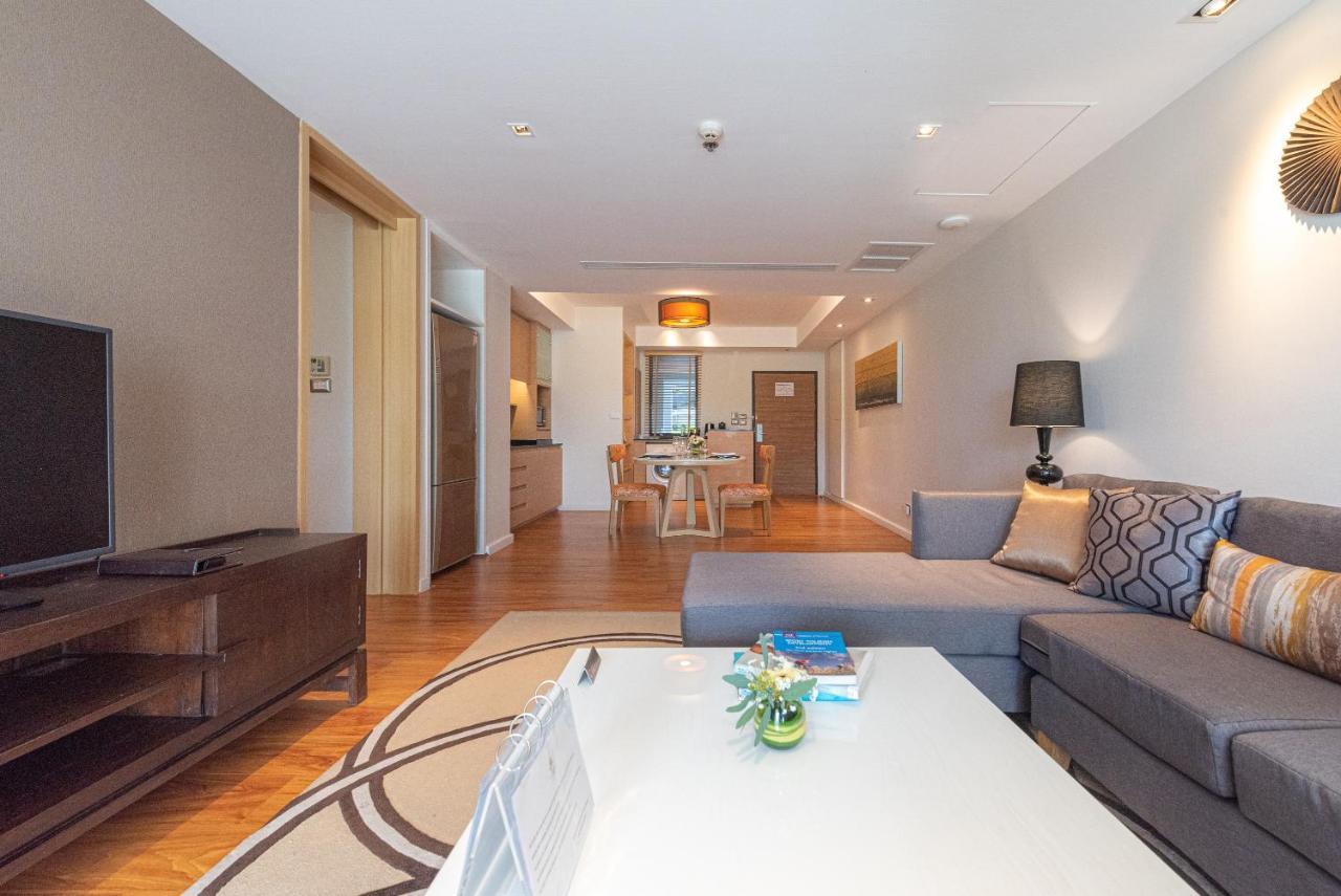 Summit Windmill Golf Suite Hotel At Suvarnabhumi Banguecoque Exterior foto A living room in a suite at the hotel