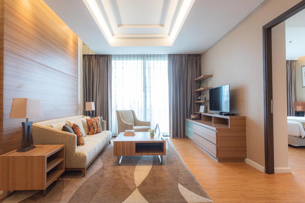 Summit Windmill Golf Suite Hotel At Suvarnabhumi Banguecoque Exterior foto A living room in a condominium